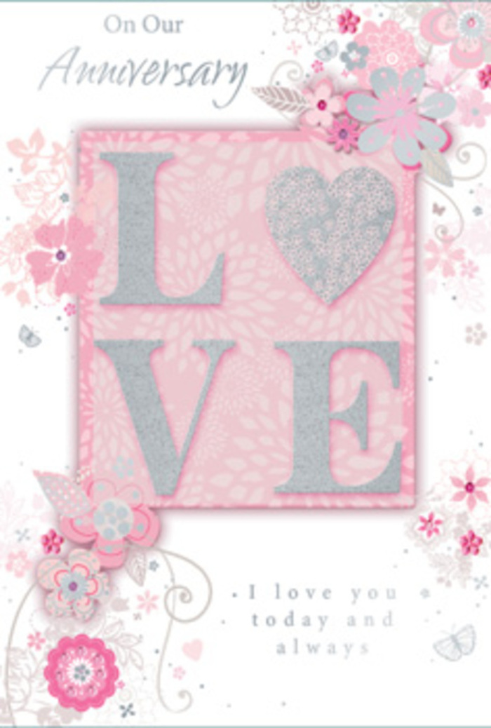 This anniversary card looks like a delicate work of floral art, translated into paper with the same care a local florist in Highams Park would use when designing a bespoke bouquet. The card's palette is composed of blush pink, creamy white, and soft silver, blending together with a gentle, dreamlike quality that recalls early spring mornings near Highams Park station, when blossoms are just beginning to open. At the centre, the word LOVE stands proudly in raised lettering, each letter dusted with a fine layer of glitter that adds dimension and a soft sparkle. The texture invites touch, giving the impression of embossed petals or velvet ribbon on a bouquet handle. Around this central motif, a halo of stylised flowers, curved leaves, and swirling tendrils sweeps across the card, their fine outlines and modest shading reminiscent of pencil sketches in a florist's notebook. The blooms are light and airy, suggesting petals in soft pink and white, with hints of silver lending a refined brightness rather than a bold shine. The background is a warm, muted pink, gently graded so that some areas feel almost translucent, like layers of tissue paper or the inside of a rose petal. An elegant script message, likely an anniversary greeting and a declaration of lasting devotion, flows across the card in fluid, looping letters that echo the curves of the floral pattern. Together, these elements create an impression of serenity, affection, and quiet celebration. The card feels perfect for a couple marking another year together in Highams Park, perhaps paired with a pastel arrangement delivered to a cosy home off Beech Hall Road, celebrating love that continues to blossom softly, year after year.